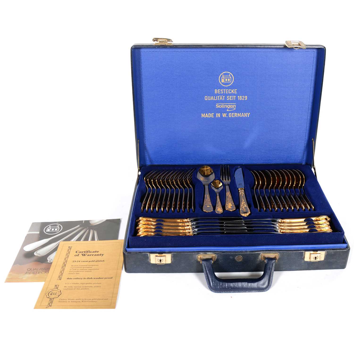 Lot 139 - Bestecke Solingen gold-plated canteen of cutlery in leather hard case.