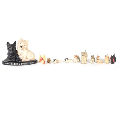Lot 22 - A collection of cold cast and plastic dog...