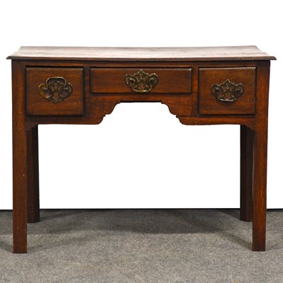 Lot 399 - George III oak lowboy