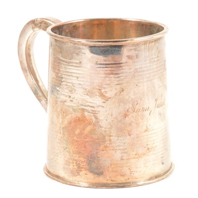 Lot 199 - A Georgian silver christening mug