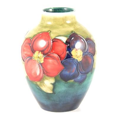 Lot 4 - Moorcroft Pottery - a Clematis pattern vase.