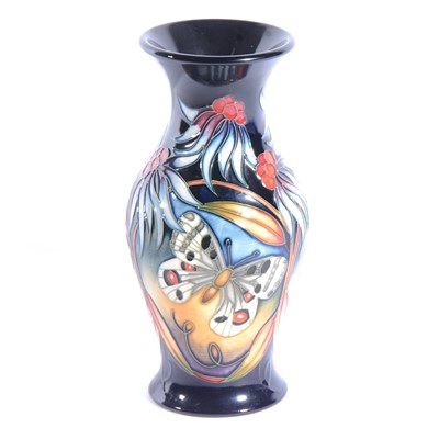 Lot 21 - Moorcroft Pottery - an Apollo Butterfly pattern vase.