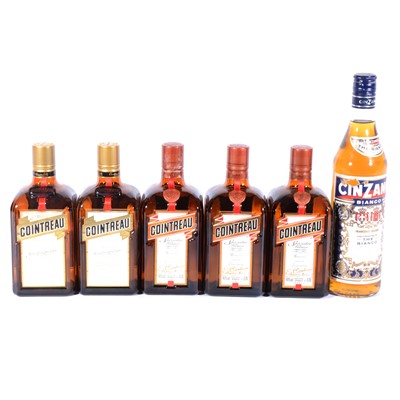 Lot 551 - Cointreau Orange Triple Sec liqueur, five bottlings, and a bottle of Cinzano Bianco Vermouth