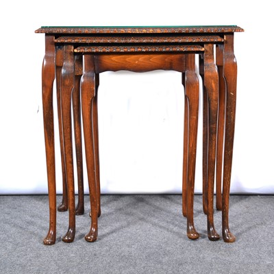 Lot 609 - Nest of three walnut coffee tables