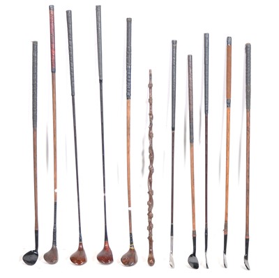Lot 115 - A collection of ten vintage golf clubs, woods and irons, some hickory.