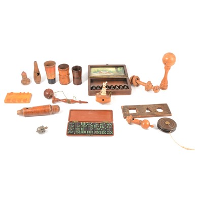 Lot 116 - A collection of treen toys, whistles; cased dominoes; dice shakers