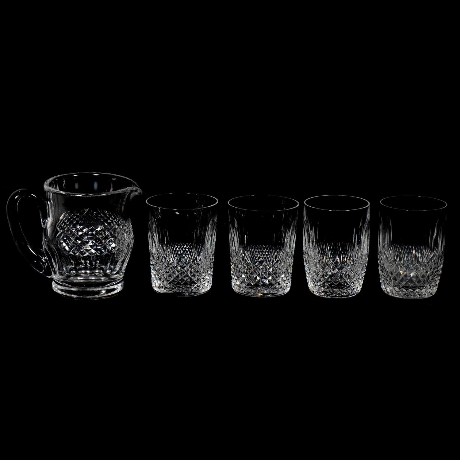 Lot 58 - Set of twelve Waterford Colleen pattern barrel tumblers and eight straight sided tumblers and a jug