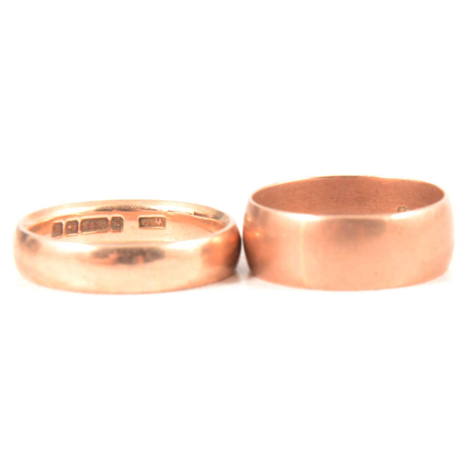 Lot 275 - Two 9 carat rose gold wedding bands.