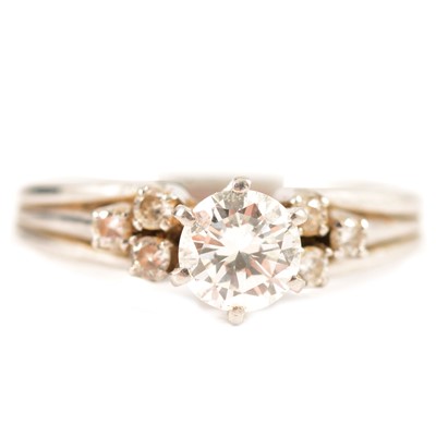 Lot 207 - A diamond solitaire ring.