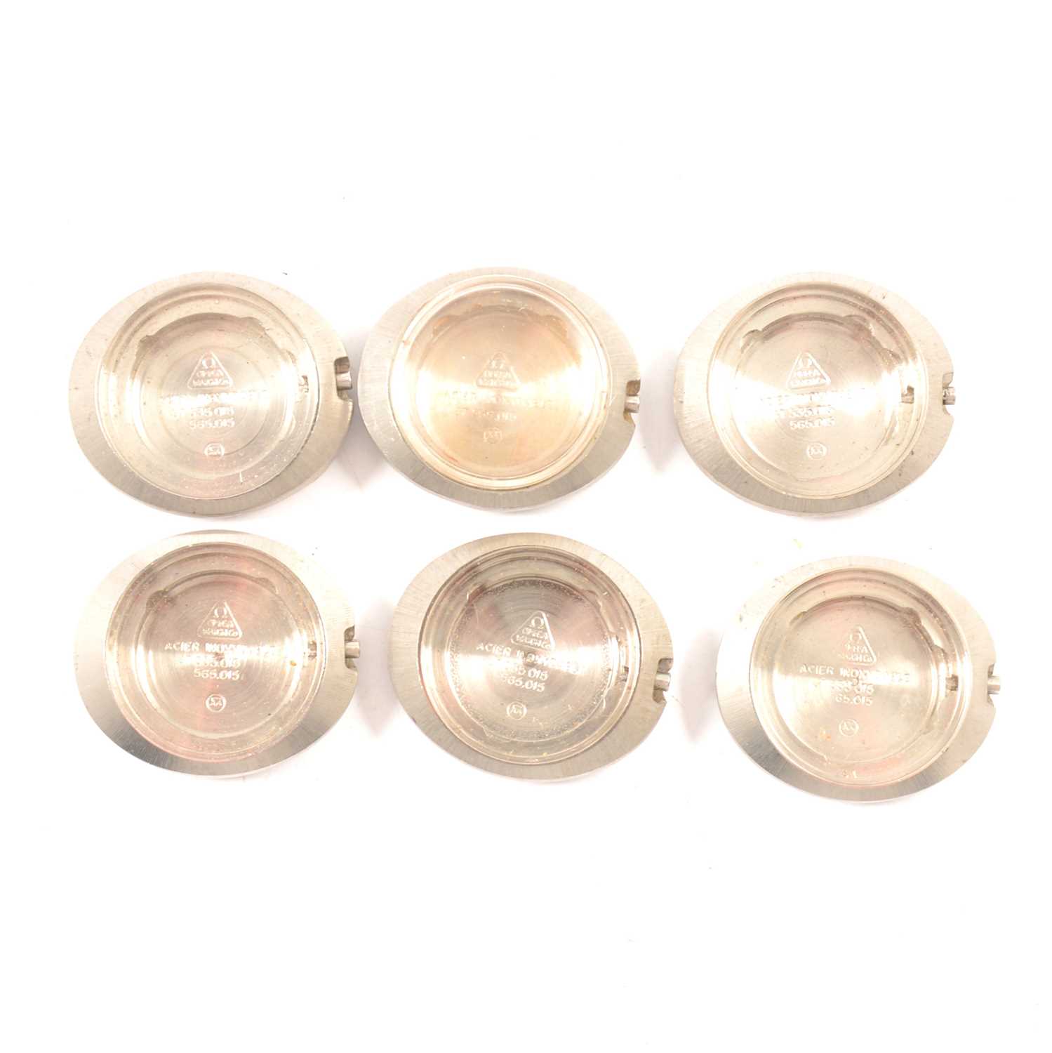 Lot 354 - Six Omega Dynamic watch cases,