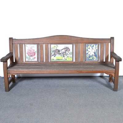 Lot 597 - Large teak garden bench with mosaic panels