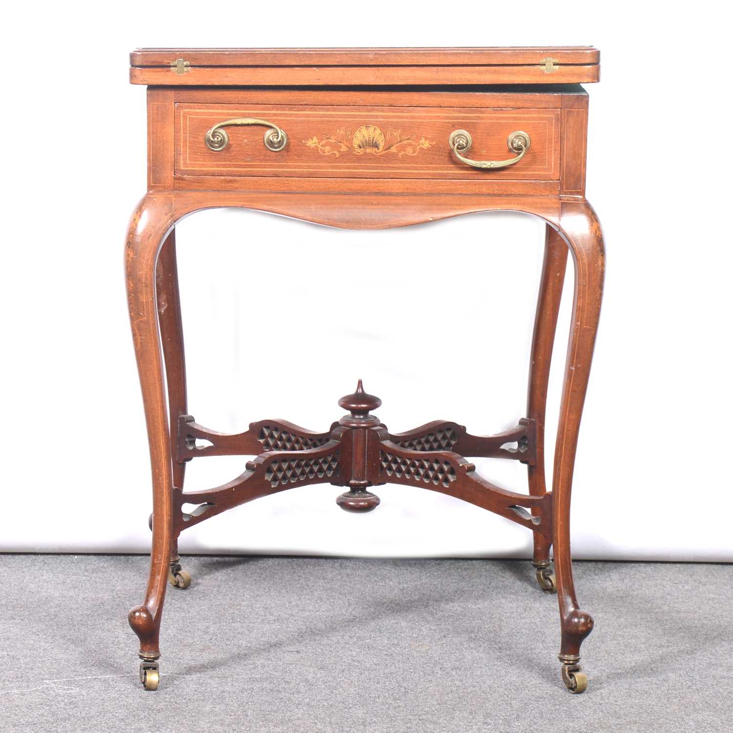 Lot 410 - Edwardian mahogany and marquetry envelope games table