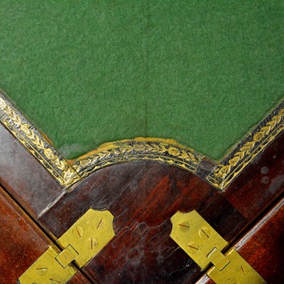 Lot 410 - Edwardian mahogany and marquetry envelope games table