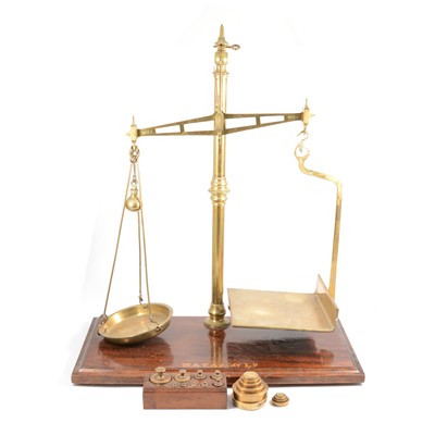 Lot 124 - Pair of large brass balance scales, with weights, by W. & T. Avery Ld etc