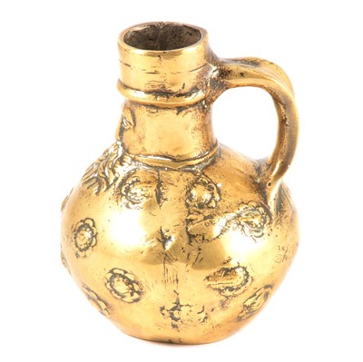 Lot 101 - Cast brass Bartmann / bellarmine jug