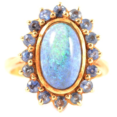 Lot 248 - A black opal and sapphire dress ring