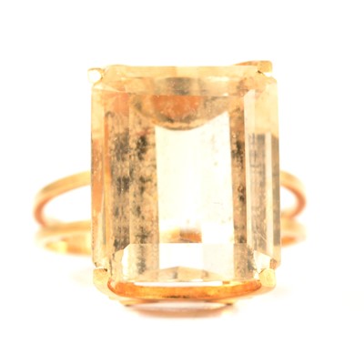 Lot 243 - A citrine dress ring.