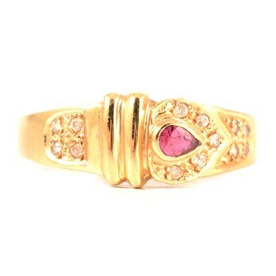 Lot 235 - A ruby and diamond dress ring.