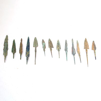 Lot 119 - A collection of Bronze Age Luristan arrowheads, all as found.