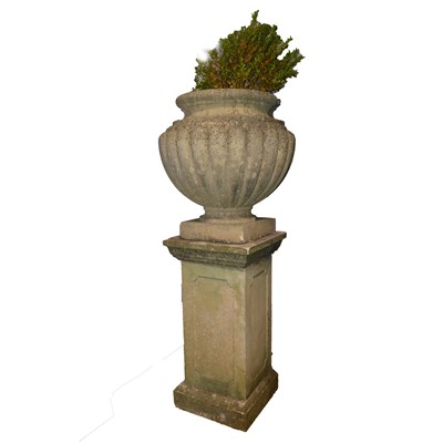 Lot 474 - Stone urn form planter, on a three-section pedestal