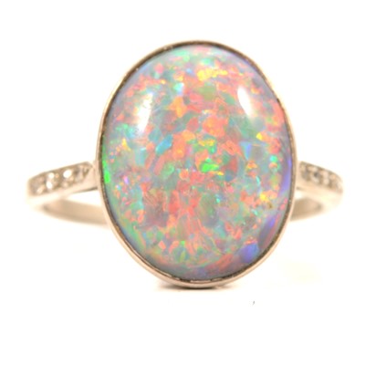 Lot 83 - A black opal solitaire ring.