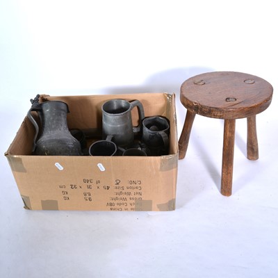 Lot 168 - A collection of pewterware and a rustic three legged stool.