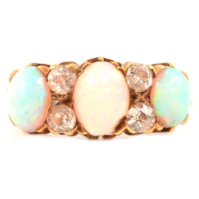Lot 91 - A Victorian opal and diamond half hoop ring.