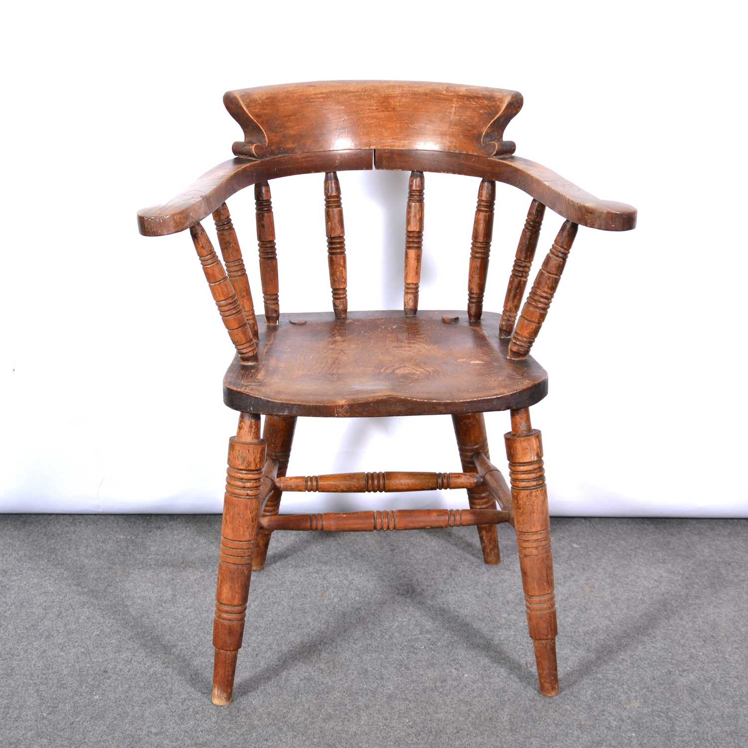 Lot 407 - Elliott & Son captain's chair, from Hilton's Shoes in Leicester