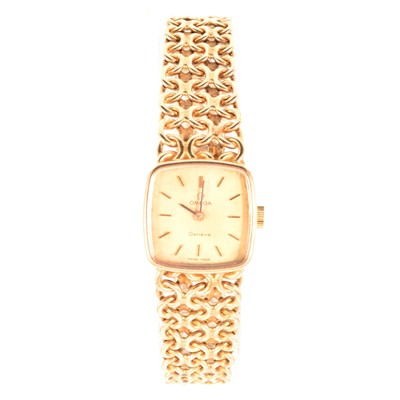 Lot 377 - Omega - a lady's 9 carat yellow gold bracelet watch.