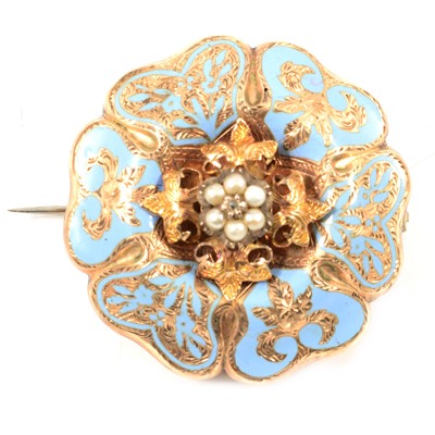 Lot 279 - A Victorian blue enamel and pearl brooch with locket back.