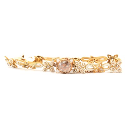 Lot 210 - A white enamel bracelet set with rose cut diamonds.