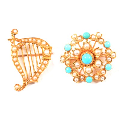 Lot 243 - A cabochon cut turquoise and pearl brooch/pendant and a seed pearl harp brooch.