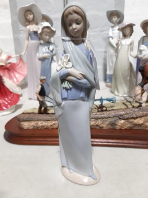 Lot 10 - Six Nao and three Lladro figurines