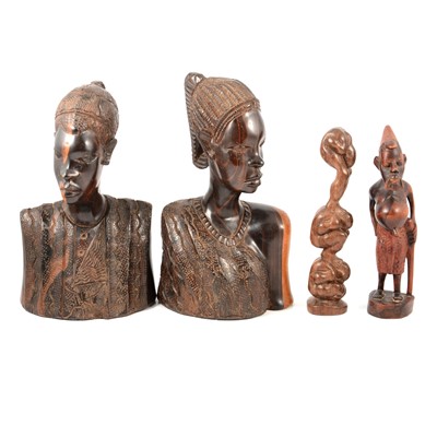 Lot 211 - Four carved wooden African figures.