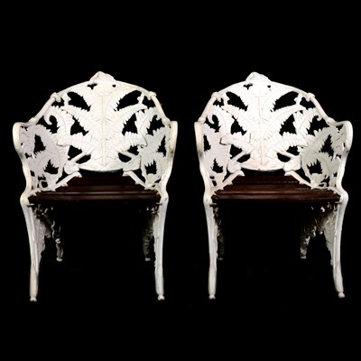 Lot 263 - Coalbrookdale style cast and white painted aluminium bench and two chairs, fern pattern