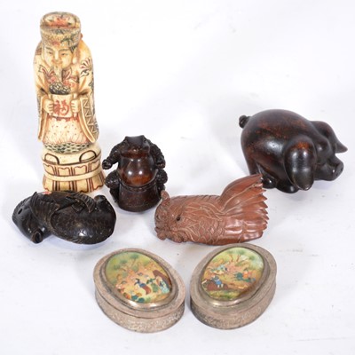 Lot 273 - A carved bone figure, three netsukes and a carved pig, pair of white base metal boxes.