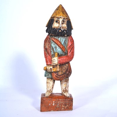 Lot 146 - Carved and painted figure on base.