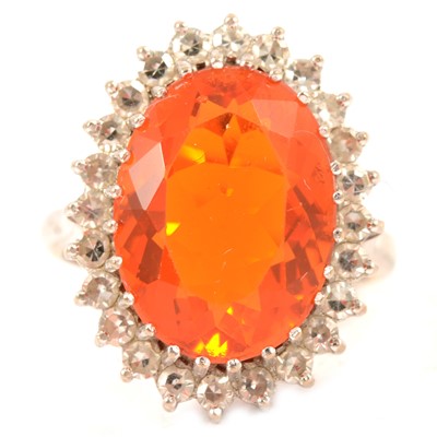 Lot 93 - A Mexican fire opal and diamond cluster ring.