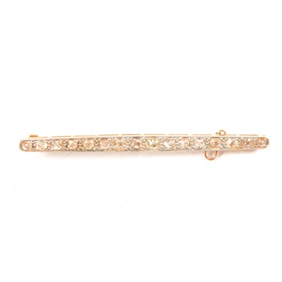 Lot 250 - A diamond bar brooch.