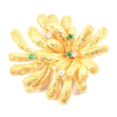 Lot 262 - A modernist 18 carat gold brooch set with emeralds and diamonds.