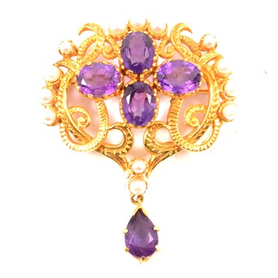 Lot 285 - A Victorian style amethyst and pearl brooch.