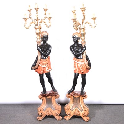 Lot 550 - Pair of carved and painted wood blackamoor floor standing candelabra