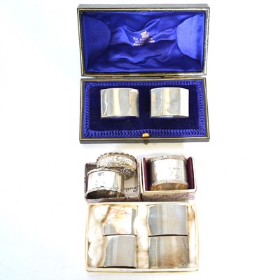 Lot 297 - Pair of silver napkin rings, Wakely & Wheeler, London 1912, and seven others.