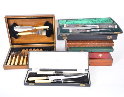 Lot 164 - Victorian and later silver-plated dessert cutlery, carving sets and fish eaters.