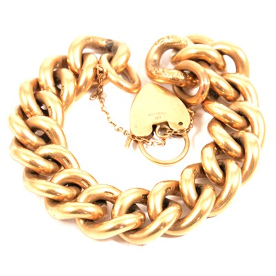 Lot 174 - A 9 carat yellow gold solid curb link bracelet.