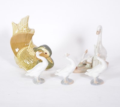 Lot 40 - Lladro Mandarin Duck bookend, three Lladro geese, and another Spanish porcelain group of geese