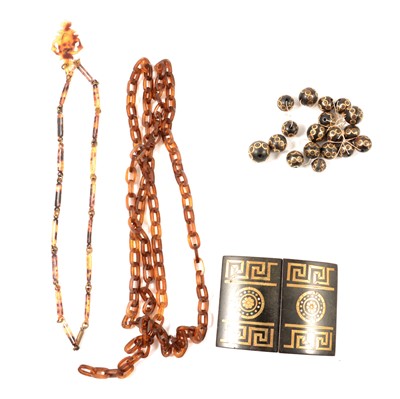 Lot 401 - A Greek Key design inlaid belt buckle, graduated beads, link chain and pendant.