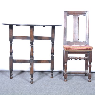 Lot 594 - Small joined oak chair, 17th century style; and an oak folding table with an oval top.