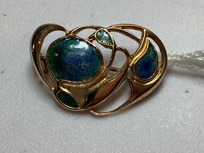 Lot 265 - Archibald Knox for Liberty - an Art Nouveau enamel brooch.