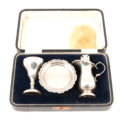 Lot 310 - A silver three piece travelling communion set by William Devenport, cased.